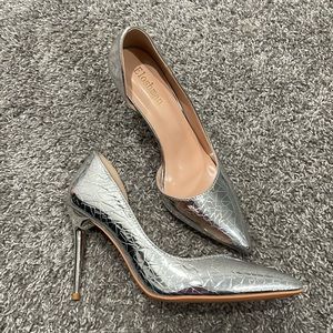 Shiny silver pumps